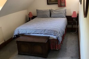 The Old Coach House bedroom with double bed