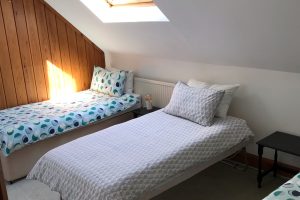 The Old Coach House bedroom with single beds
